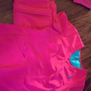 4 different scrubs. Sizes are medium and small